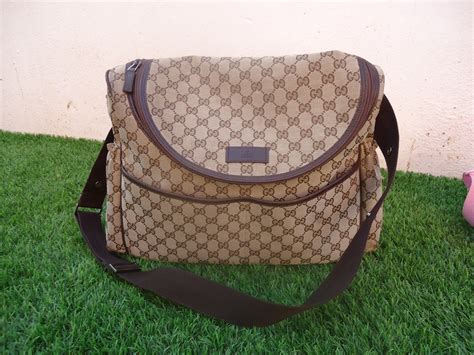 gucci bolso para bebes.